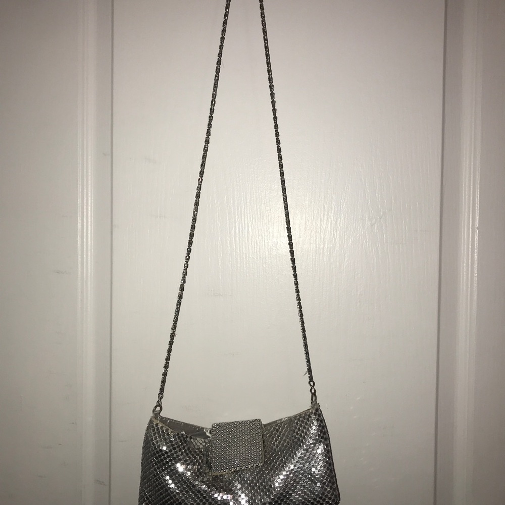Silver Clutch with Sleek Design and Wristlet